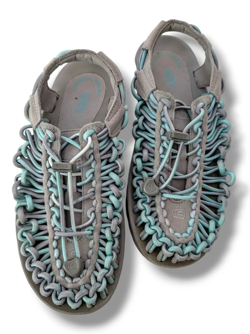 NWOT KEEN Women's Uneek open-air cord sandals in a grey and aqua blue colorway